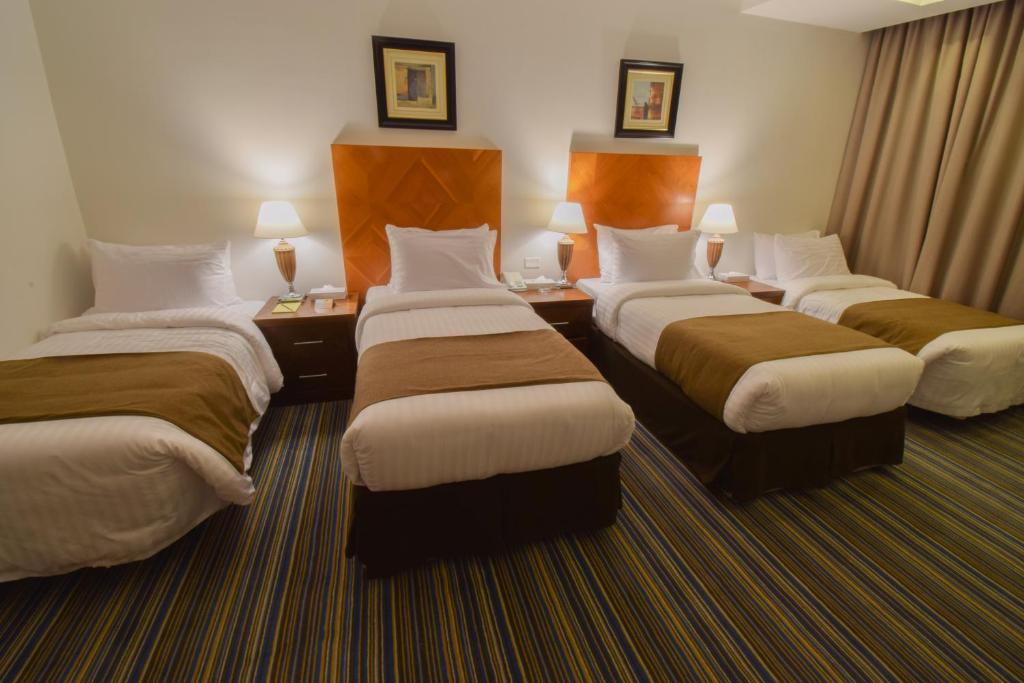 4-bed-hotel-grand-al-massa-travel-umroh-riau-harga-paket-umroh-pekanbaru-riau-2023-biaya-umroh-pekanbaru-riau-2023-travel-umroh-terbaik-pekanbaru-riau