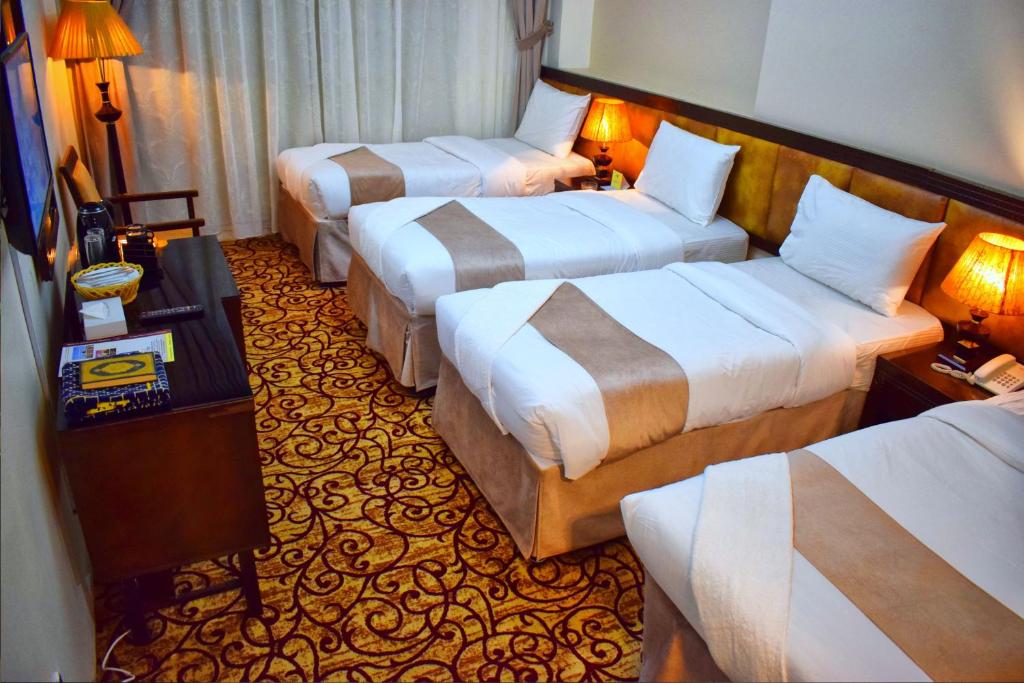 bed-4-hotel-madinah-concorde-travel-umroh-riau-harga-paket-umroh-pekanbaru-riau-2023-biaya-umroh-pekanbaru-riau-2023-travel-umroh-terbaik-pekanbaru-riau